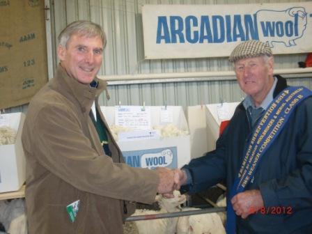 Peter congratulating Les on his win in the ewe weaner competition